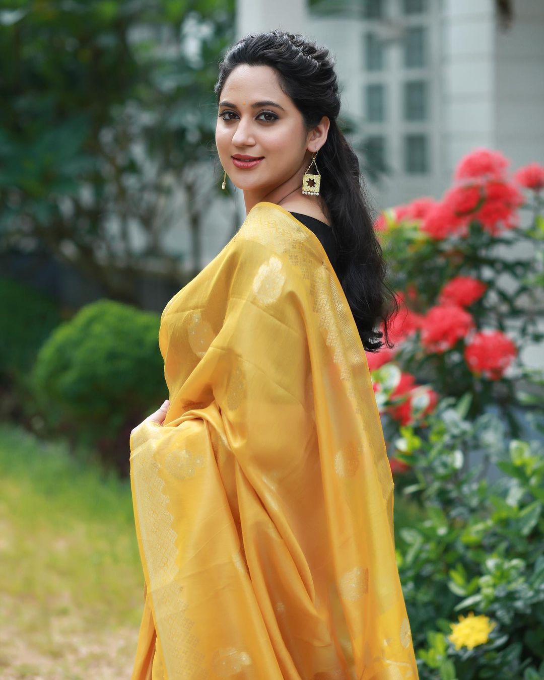 Malayalam Actress Miya George Stills in Yellow Saree Black Blouse